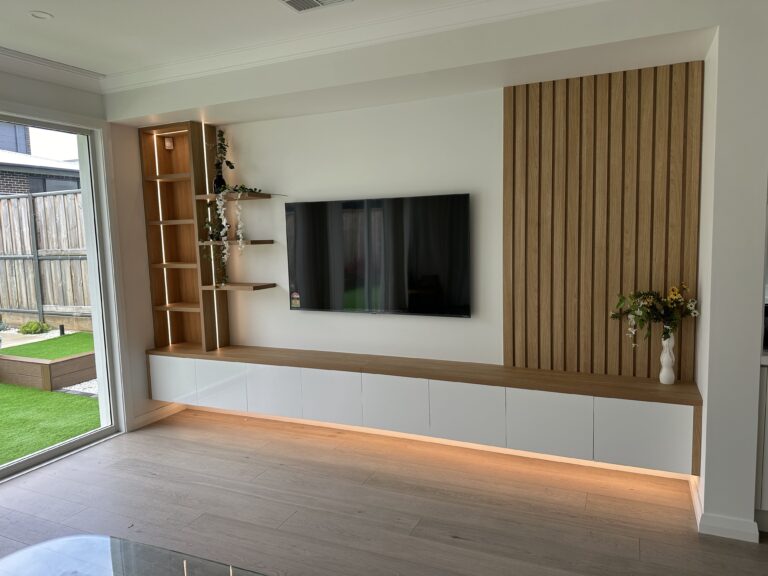 Hills Wide Kitchens - Modern wood panel entertainment unit with shelves